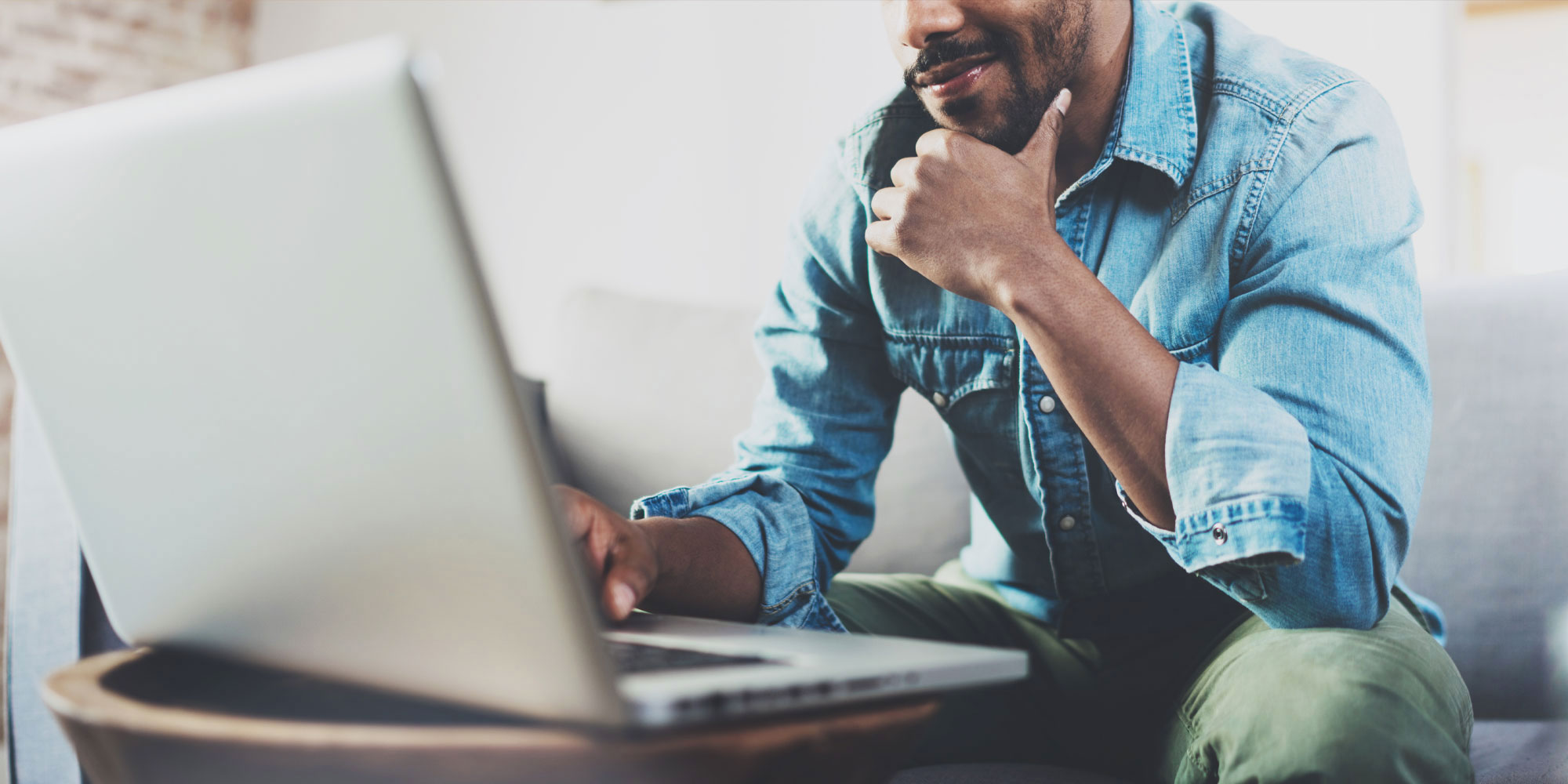 man on computer looking at privacy policy