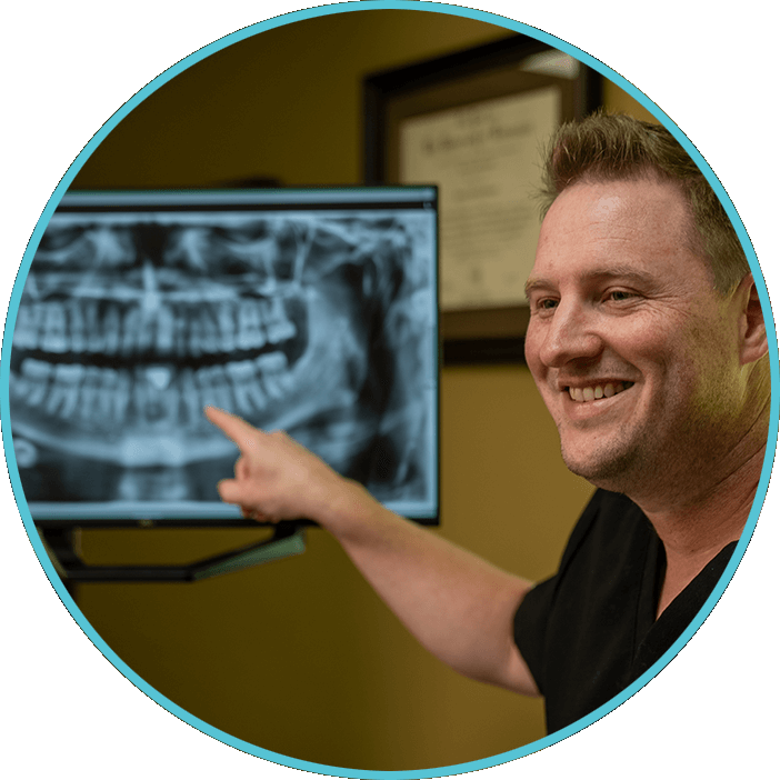 Doctor Pointing at x-ray