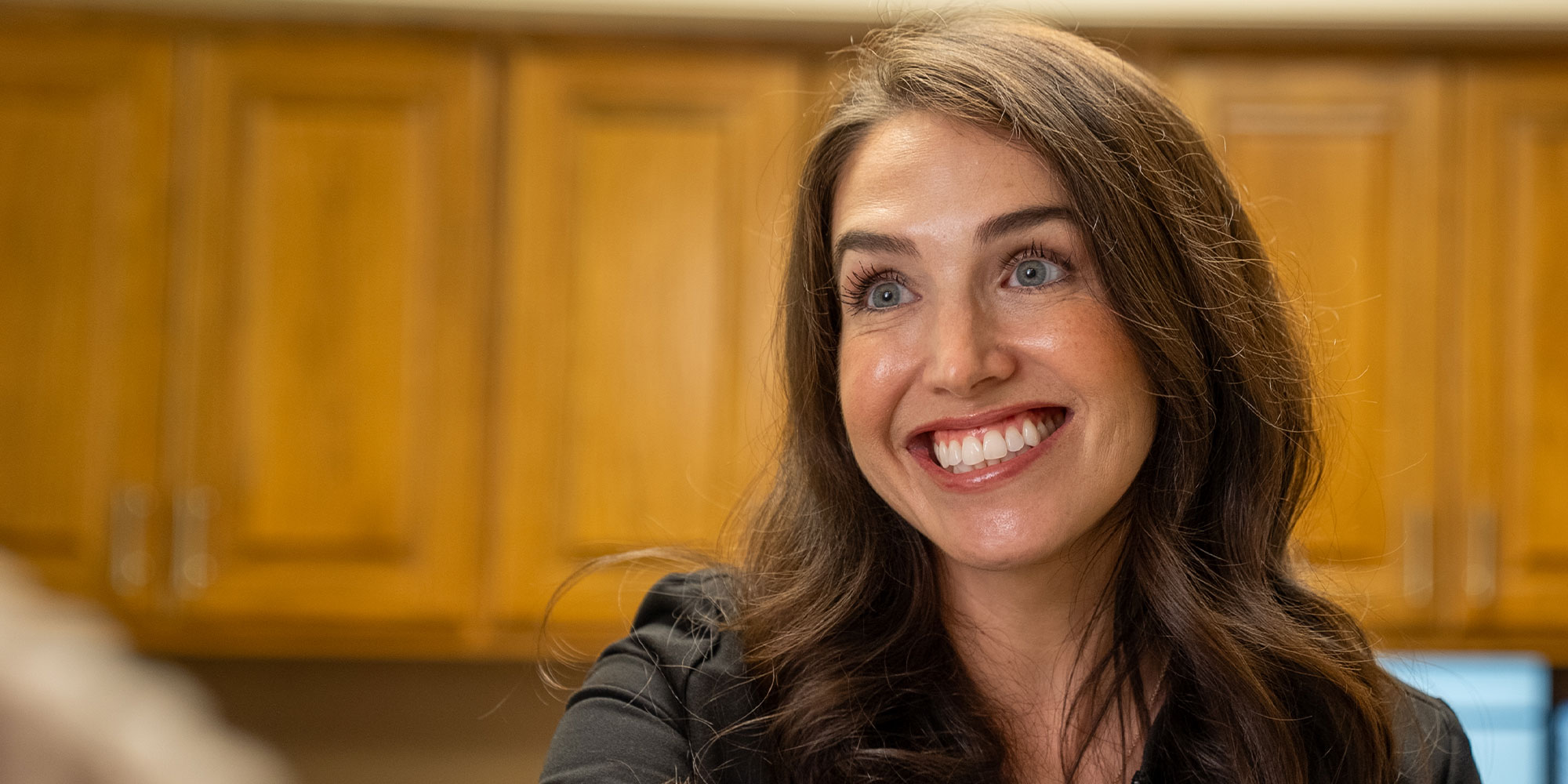 Team member smiling