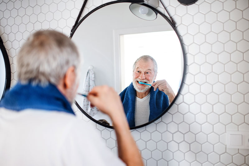 Man brushing teeth